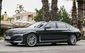 Sleek Bmw 7 Series In Urban Setting Wallpaper