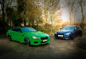 Sleek Bmw M6 Coupe On The Road Wallpaper