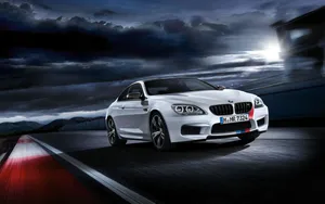 Sleek Bmw M6 In Action Wallpaper