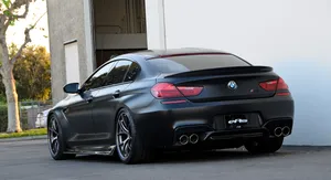 Sleek Bmw M6 On The Open Road Wallpaper