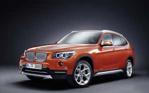 Sleek Bmw X1 In Motion Wallpaper