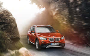 Sleek Bmw X1 In The Heart Of The City Wallpaper