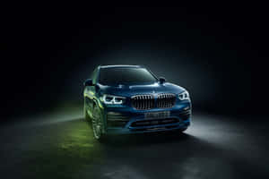 Sleek Bmw X3 On The Road Wallpaper