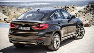 Sleek Bmw X6 In Full Glory Wallpaper