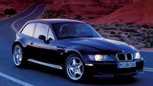 Sleek Bmw Z3 Roadster In Action Wallpaper