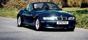 Sleek Bmw Z3 Roadster In Action Wallpaper