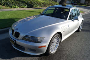 Sleek Bmw Z3 Roadster Parked Amidst Nature Wallpaper