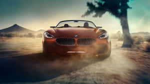 Sleek Bmw Z4 On The Road Wallpaper