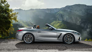 Sleek Bmw Z4 Roadster In Action Wallpaper