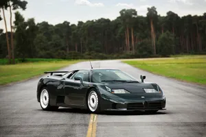 Sleek Bugatti Eb110 In A Natural Setting Wallpaper