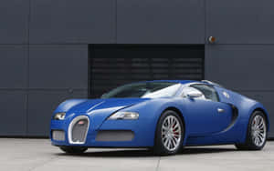 Sleek Bugatti Veyron In A Night City Setting Wallpaper