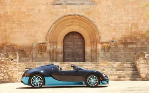 Sleek Bugatti Veyron Speeding On The Highway Wallpaper