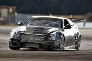 Sleek Cadillac Ats Cruising The Open Road Wallpaper
