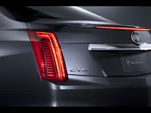 Sleek Cadillac Cts In Motion Wallpaper