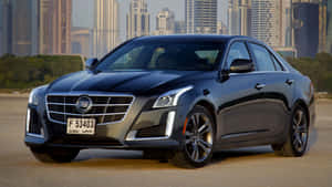 Sleek Cadillac Cts On The Road Wallpaper