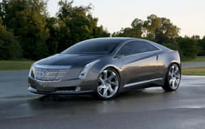 Sleek Cadillac Elr In Motion Wallpaper