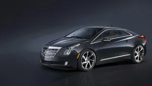 Sleek Cadillac Elr Showcasing Its Elegance In High-quality Wallpaper Wallpaper