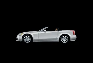 Sleek Cadillac Xlr On The Road Wallpaper