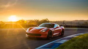 Sleek Chevrolet Corvette Grand Sport In Action Wallpaper