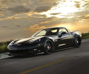 Sleek Chevrolet Corvette Z06 In Action Wallpaper