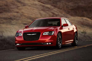 Sleek Chrysler 300 Cruising The Streets Wallpaper