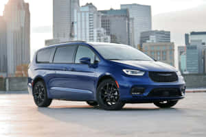 Sleek Chrysler Pacifica On City Street Wallpaper