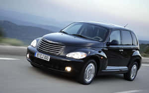 Sleek Chrysler Pt Cruiser In Suburban Setting Wallpaper