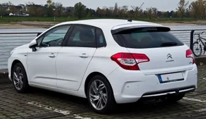 Sleek Citroen C4 Standing Tall On The Streets Wallpaper