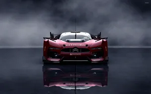 Sleek Citroen Ds Survolt Racing On Track Wallpaper