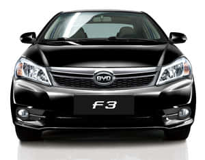 Sleek Design Of Byd F3 In Dramatic Lighting Wallpaper