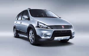 Sleek Dongfeng Sports Car On A Scenic Road Wallpaper