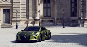 Sleek Ds Automobile In A Scenic Setting Wallpaper