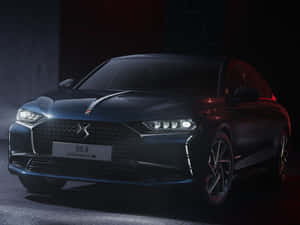 Sleek Ds Automobile On The Road Wallpaper