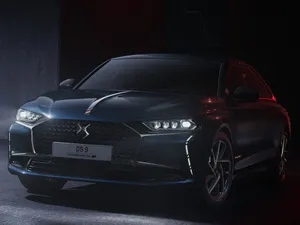 Sleek Ds Automobile On The Road Wallpaper