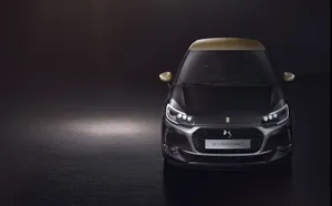 Sleek Ds Automobile On The Road Wallpaper