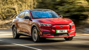 Sleek Electric Vehicle Charging At Station Wallpaper