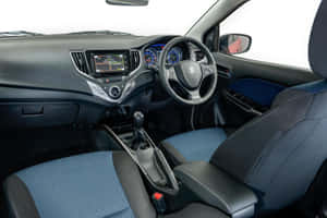 Sleek Elegance Of Suzuki Baleno On Display Wallpaper