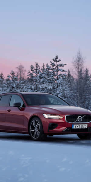 Sleek, Eye-catching Volvo V60 On A Mountain Road Wallpaper