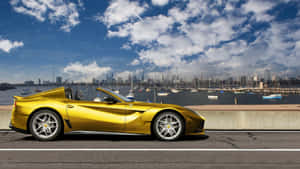 Sleek Ferrari F12 Berlinetta On Open Road Wallpaper