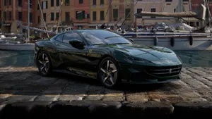Sleek Ferrari Portofino Cruising On The Road Wallpaper