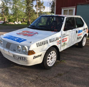 Sleek Fiat Ritmo In Vibrant City Setting Wallpaper