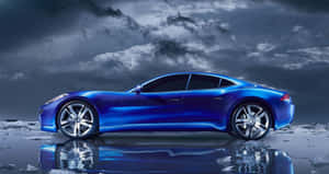 Sleek Fisker Electric Vehicle In A Night Cityscape Setting Wallpaper