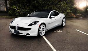 Sleek Fisker Electric Vehicle On The Road Wallpaper