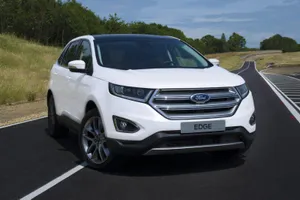 Sleek Ford Edge On A Scenic Drive Wallpaper
