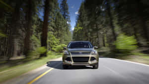 Sleek Ford Escape Suv In Nature Setting Wallpaper