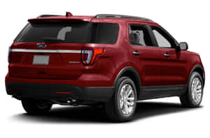 Sleek Ford Explorer Cruising On A Scenic Road Wallpaper