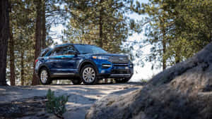 Sleek Ford Explorer On The Open Road Wallpaper