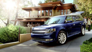 Sleek Ford Flex Cruising Down The Picturesque Highway Wallpaper