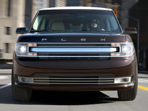 Sleek Ford Flex On A City Street Wallpaper