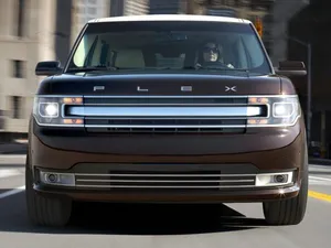 Sleek Ford Flex On A City Street Wallpaper